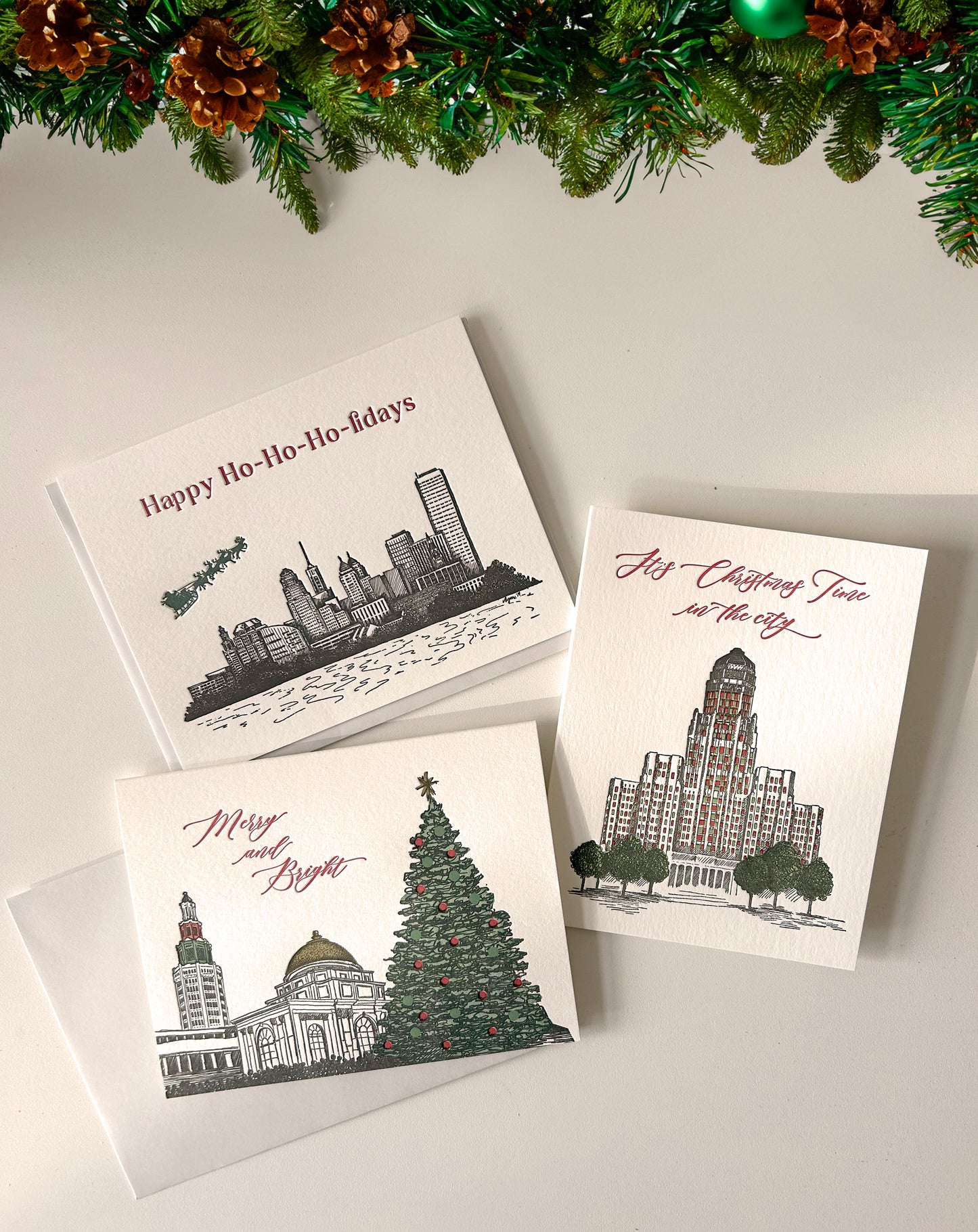 A variety of buffalo- holiday themed letterpress cards by Rust Belt Love