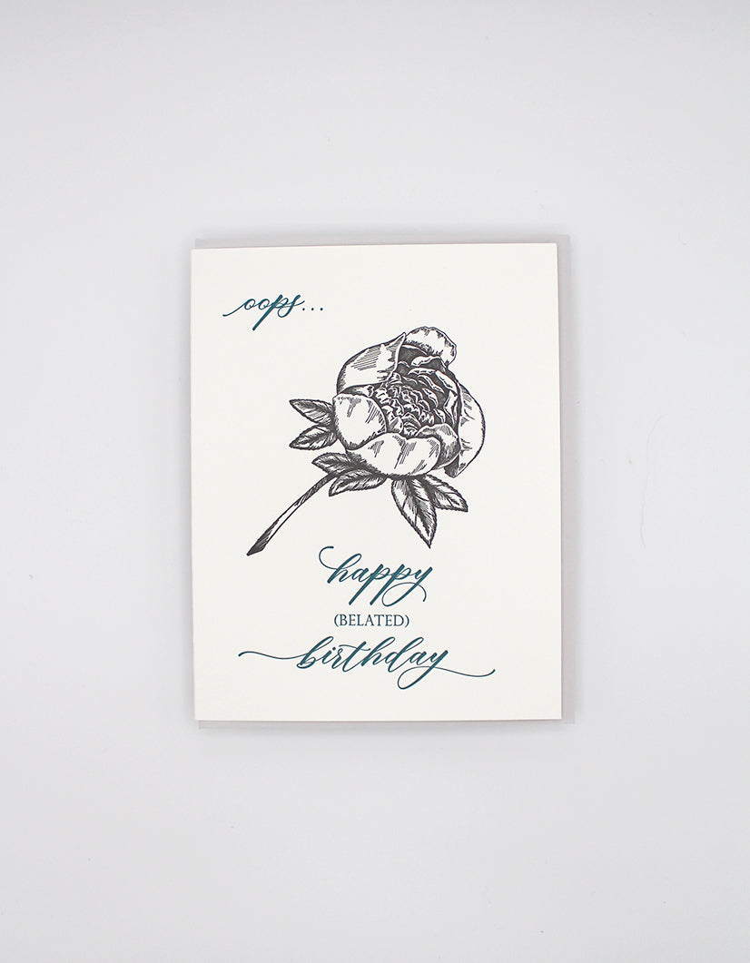 Letterpress birthday card with black floral that reads "oops...happy (belated) birthday" by Rust Belt Love