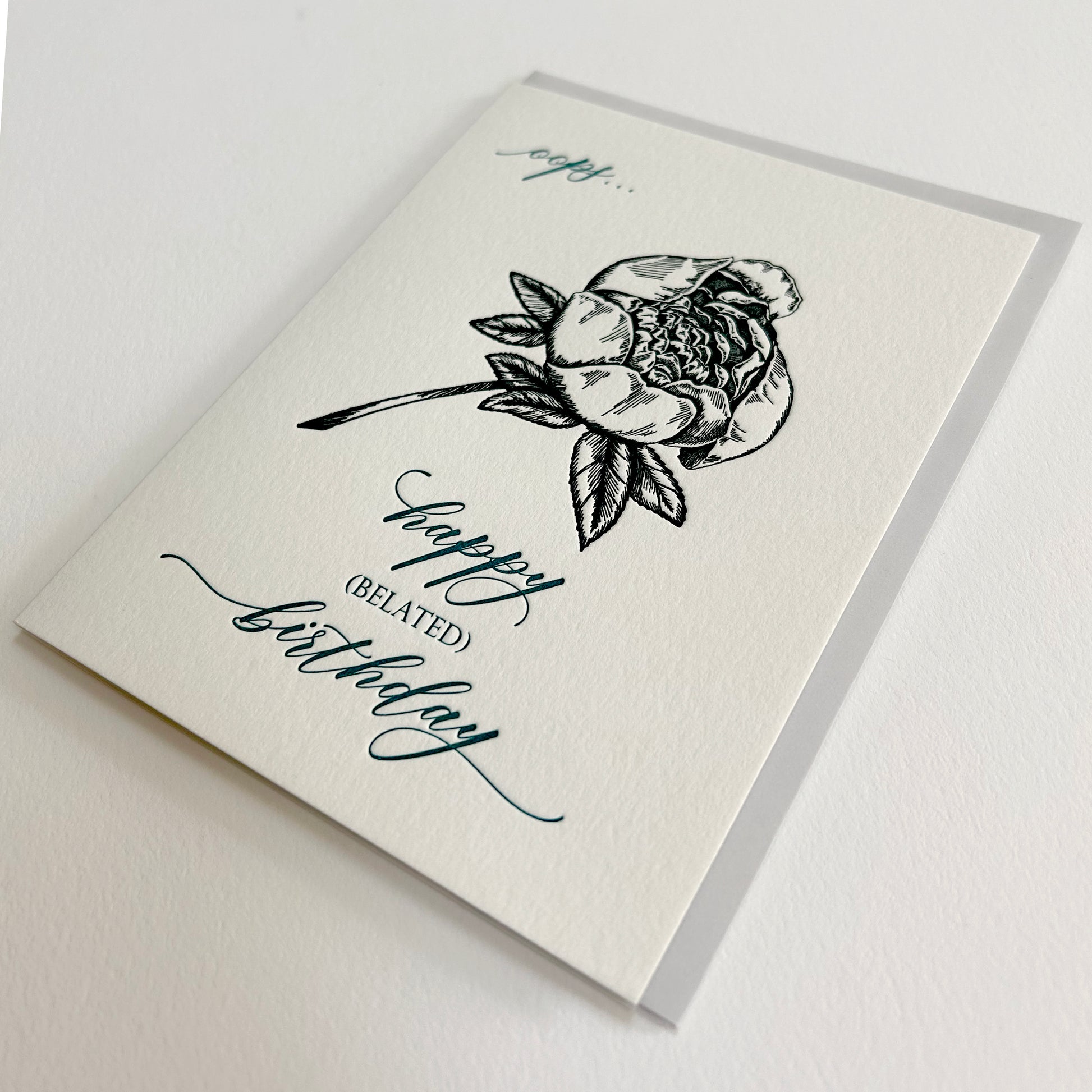Letterpress birthday card with black floral that reads "oops...happy (belated) birthday" by Rust Belt Love