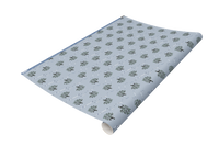 Blue mistletoe patterned wrapping paper roll from Rust Belt Love