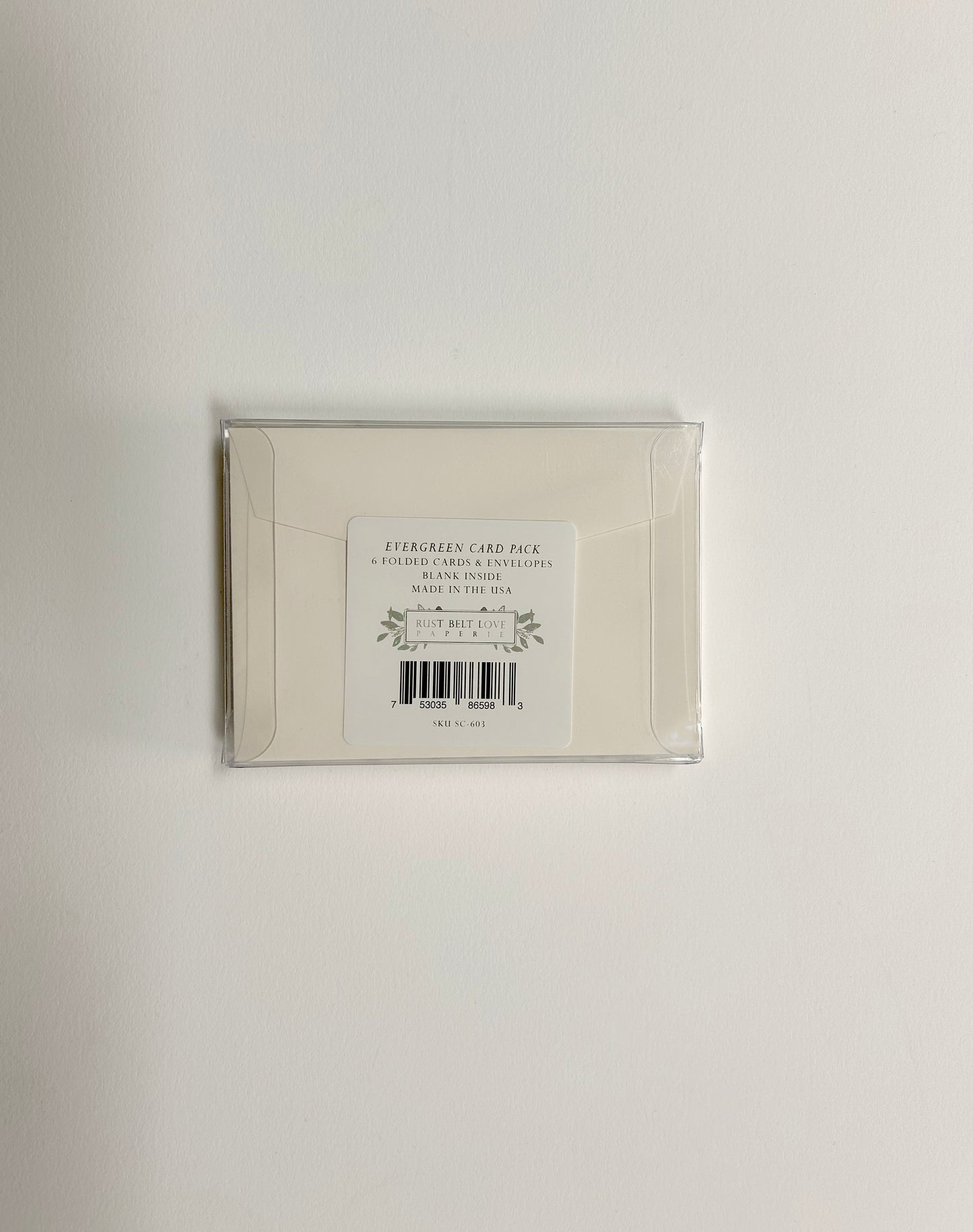 back of small card packaging by Rust Belt Love