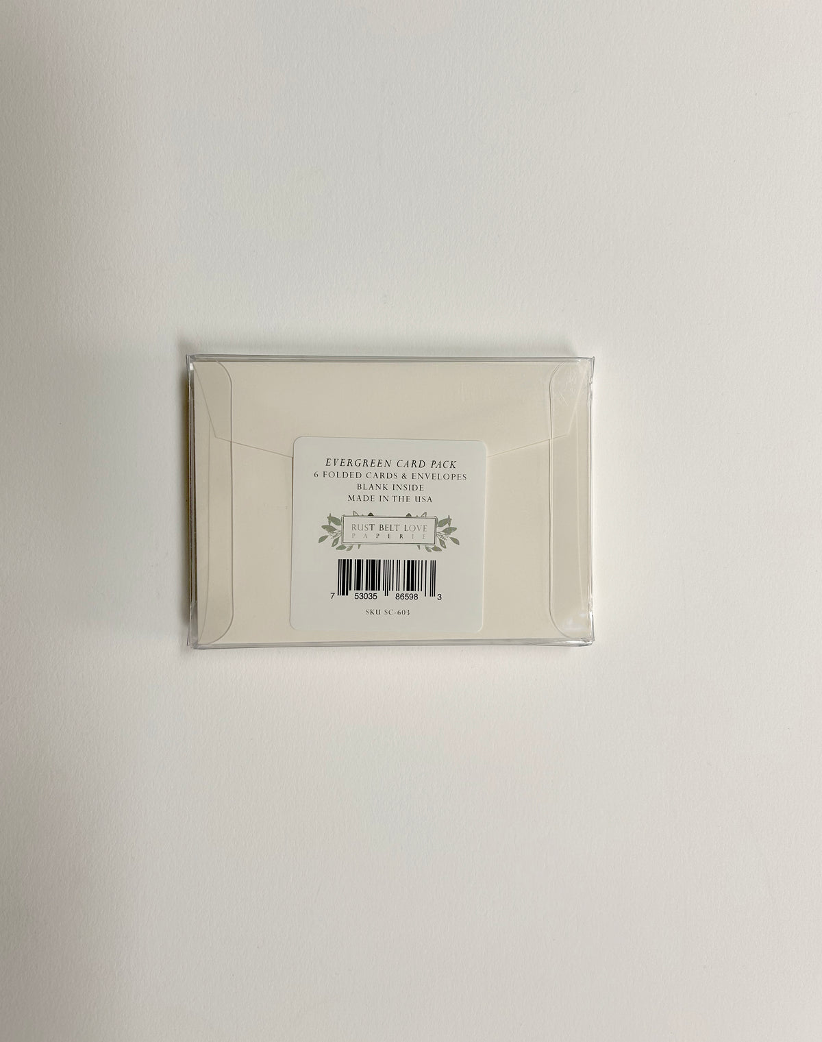 back of small card packaging by Rust Belt Love