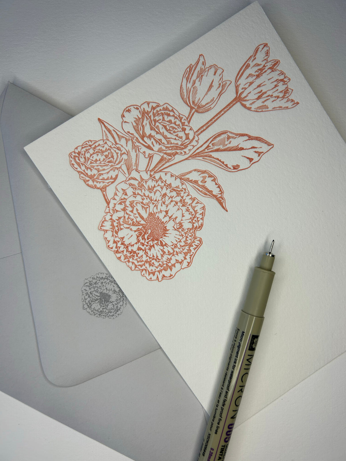 Letterpress flat note card with a peach floral bouquet and matching printed grey envelope by Rust Belt Love