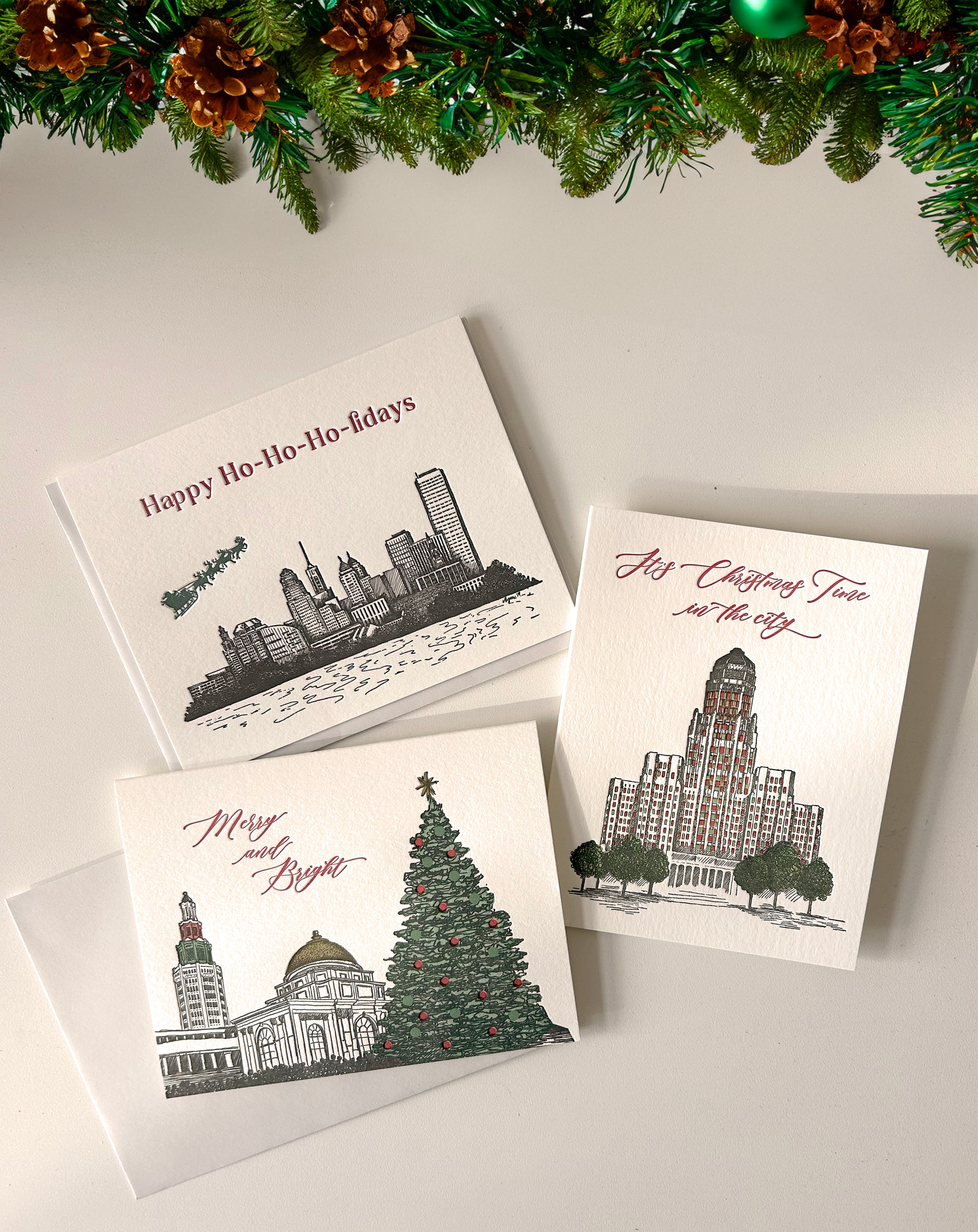 A variety of buffalo- holiday themed letterpress cards by Rust Belt Love