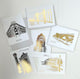 Array of gold foil Buffalo landmark cards by Rust Belt Love