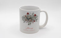 White ceramic mug with floral illustration and the words Flowers Always + Always