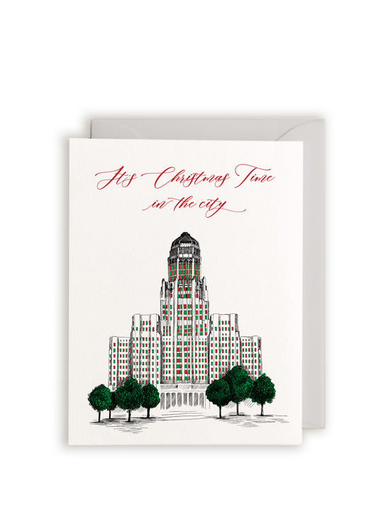 Letterpress greeting card with Buffalo's city hall illustrated on it that reads "It's Christmas Time in the city" by Rust Belt Love.