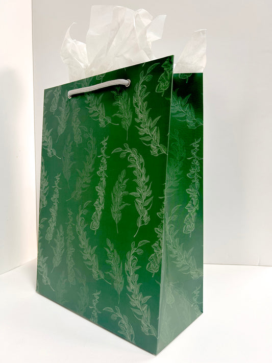 Standing picture of green gift bag with eucalyptus print by Rust Belt Love