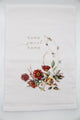 White Tea Towel with florals that says "home sweet home" by Rust Belt Love