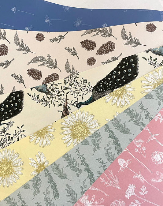 Vine and bird designed wrapping paper from Rust Belt Love