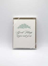 Rust Belt Love's boxed holiday set with holiday letterpress cards that read "Good Tidings to you and yours".
