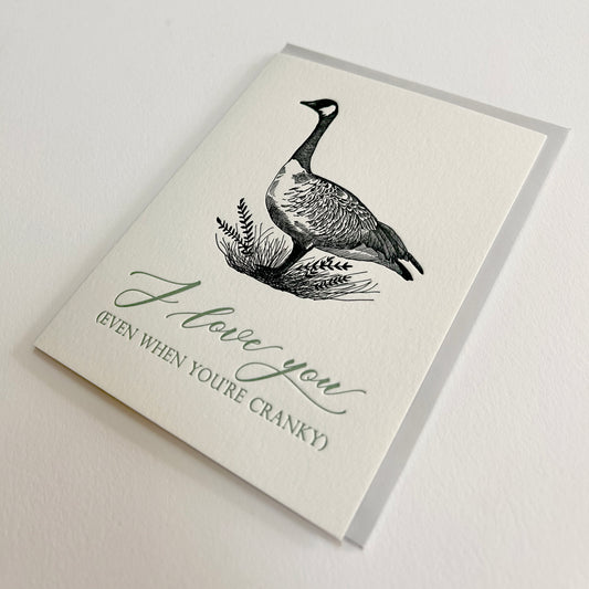 Letterpress love greeting card with a goose illustration on it that reads "I love you (even when you're cranky)" by Rust Belt Love