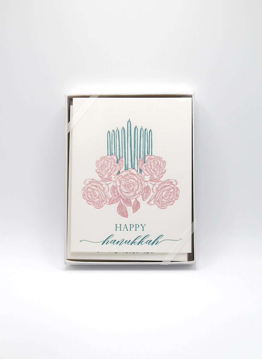 Box of letterpress holiday cards with florals and candles that says "Happy Hanukkah" by Rust Belt Love
