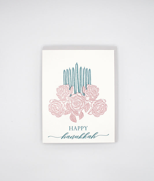 Box of letterpress holiday cards with florals and candles that says "Happy Hanukkah" by Rust Belt Love