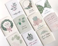 A variety of Rust Belt Love's letterpress holiday cards