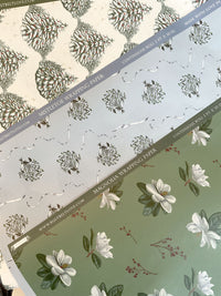 A variety of Rust Belt Love's holiday gift wrap