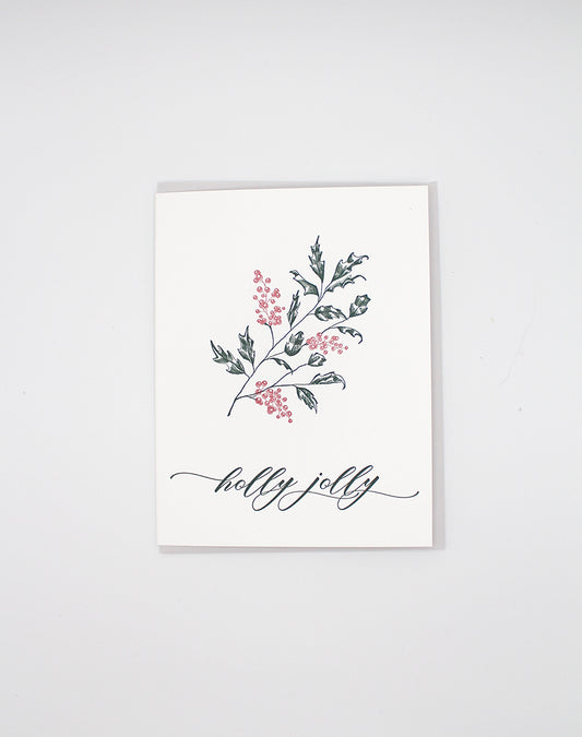 Box of letterpress holiday cards with holly that says "holly jolly" by Rust Belt Love