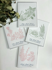 A variety of Rust Belt Love's floral birth month letterpress cards.