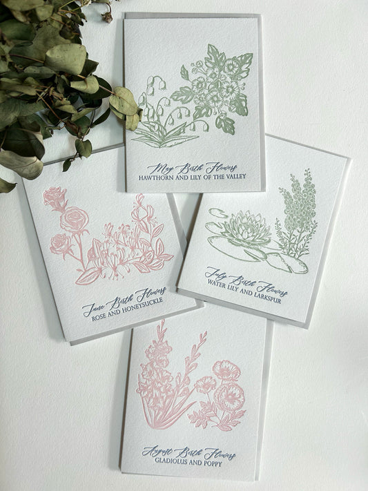 Letterpress birthday card with green florals that reads "May birth flowers hawthorn and lily of the valley" by Rust Belt Love
