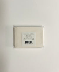 Back of clear box packaging for Rust Belt Love's small note card
