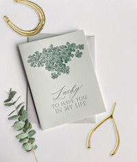 Letterpress card with shamrocks that says "Lucky to have you in my life" by Rust Belt Love