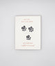 Letterpress sympathy card with black paw prints that reads "May time heal your heart and memories comfort your soul" by Rust Belt Love