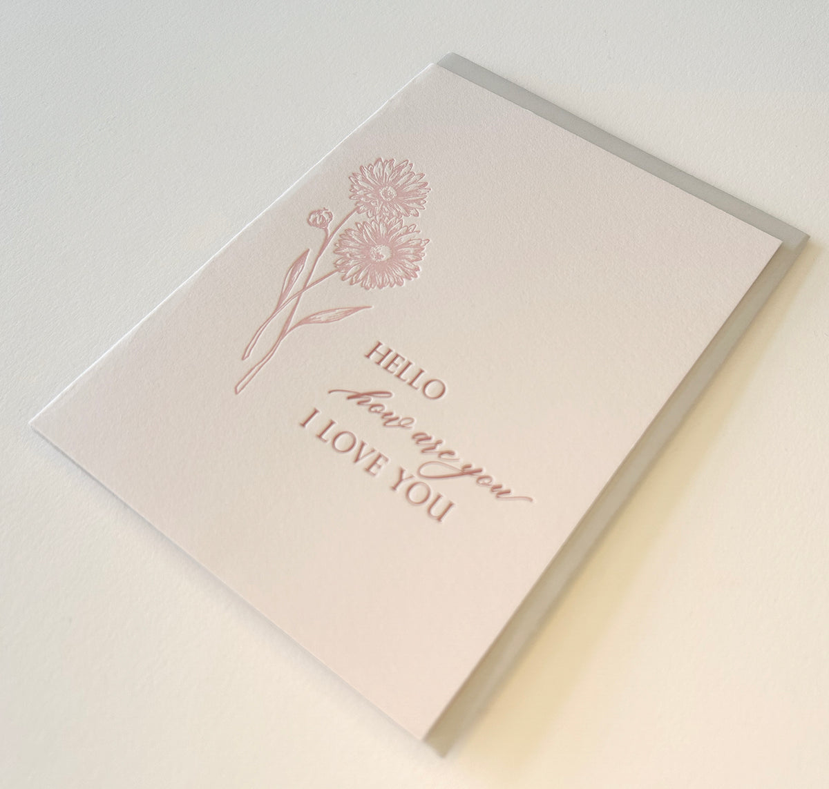 Letterpress friendship card with florals that says "Hello how are you I love you" by Rust Belt Love