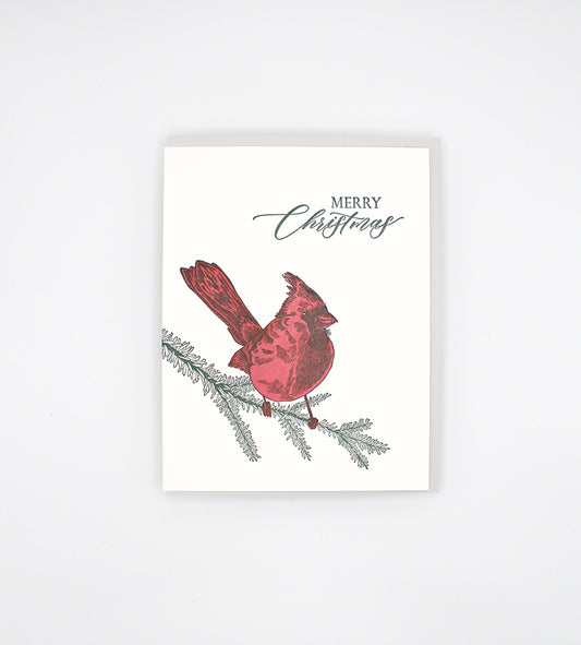 Boxed letterpress holiday card with a red cardinal that reads "merry christmas" by Rust Belt Love