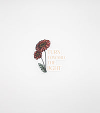 Floral sticker by Rust Belt Love that reads "turn towards the light"
