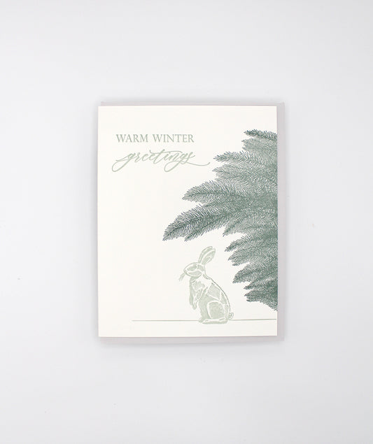 Box of letterpress holiday cards with bunny that says "Warm Winter Greetings" by Rust Belt Love
