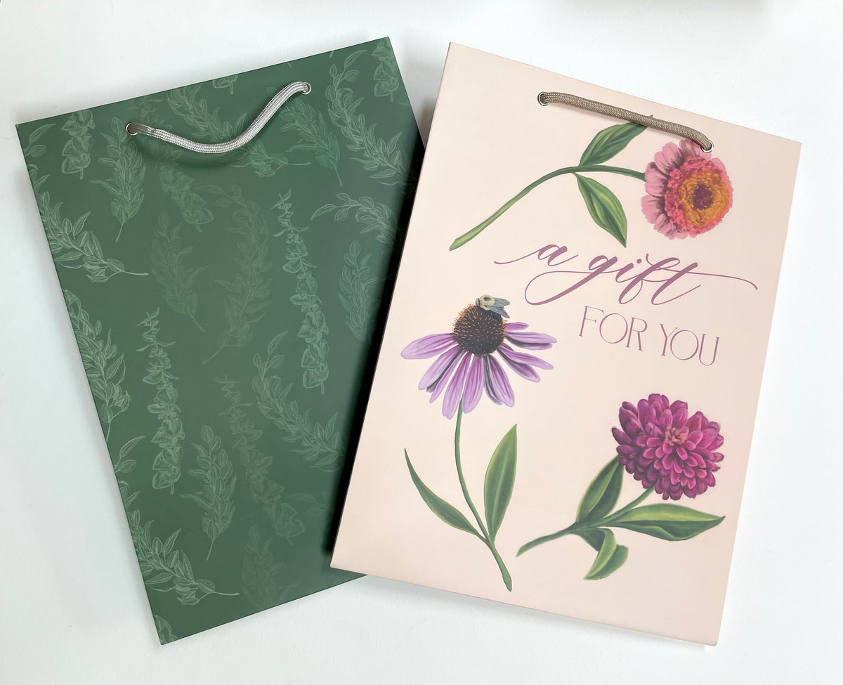 Flat lay of two gift bags by Rust Belt Love