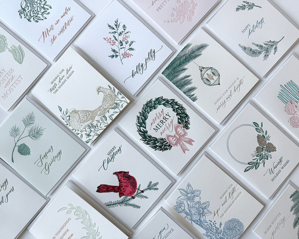 Collection of Christmas-themed greeting cards with various designs on a white background.