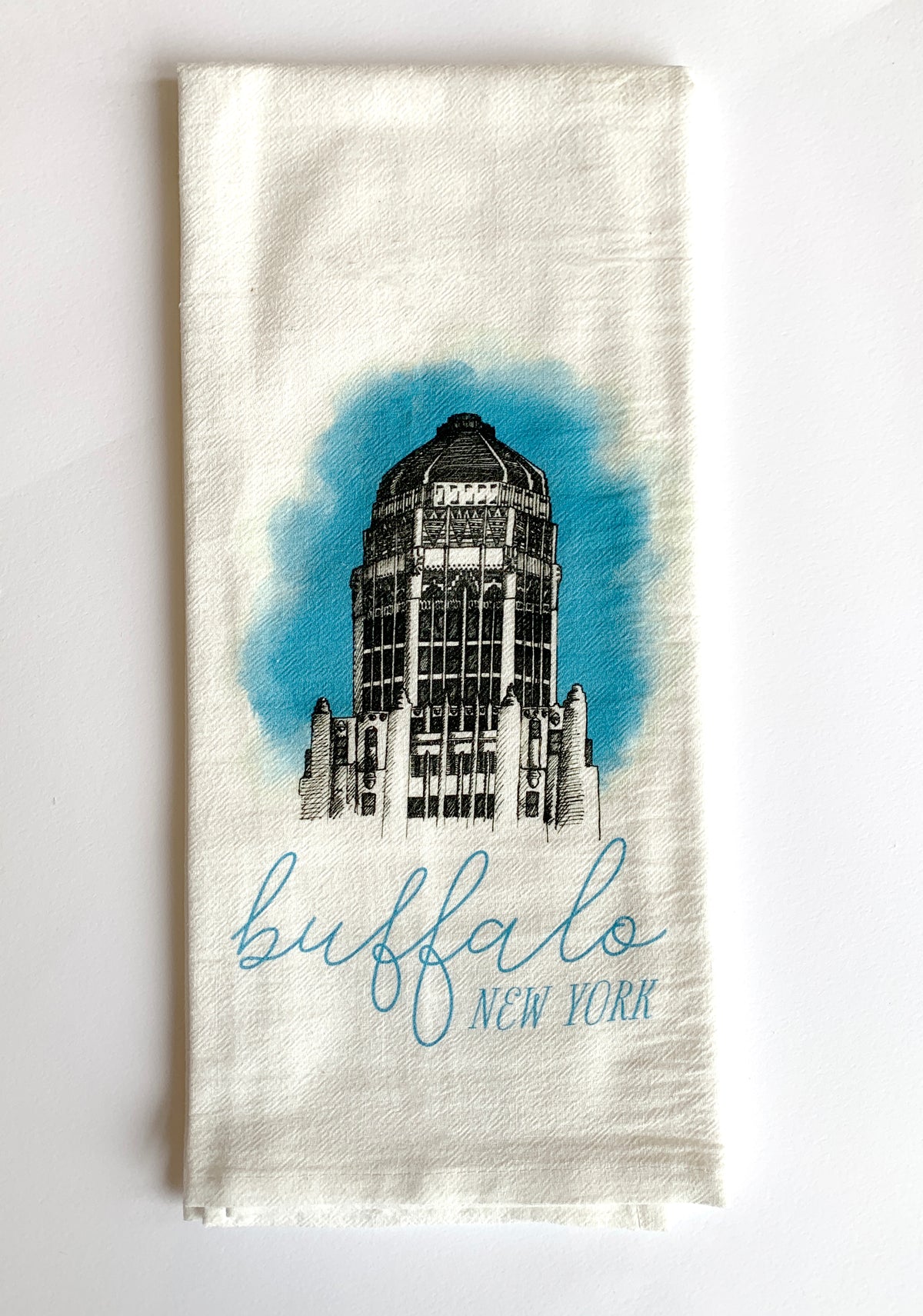 White tea towel with city hall that says "buffalo new york" by In Good Company