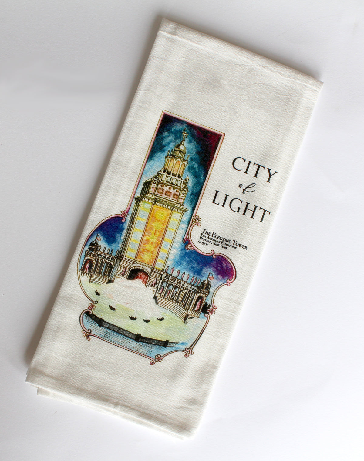 White Tea Towel with electric tower illustration that says "City of Light" by In Good Company