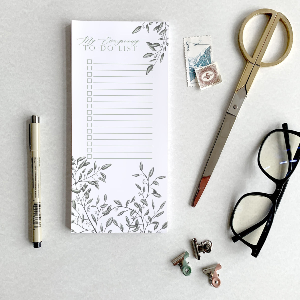 3.5 by 8.5 notepad with lined sheets with florals that says "My ever-growing to-do list" by In Good Company