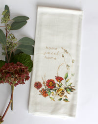 White Tea Towel with florals that says "home sweet home" by In Good Company