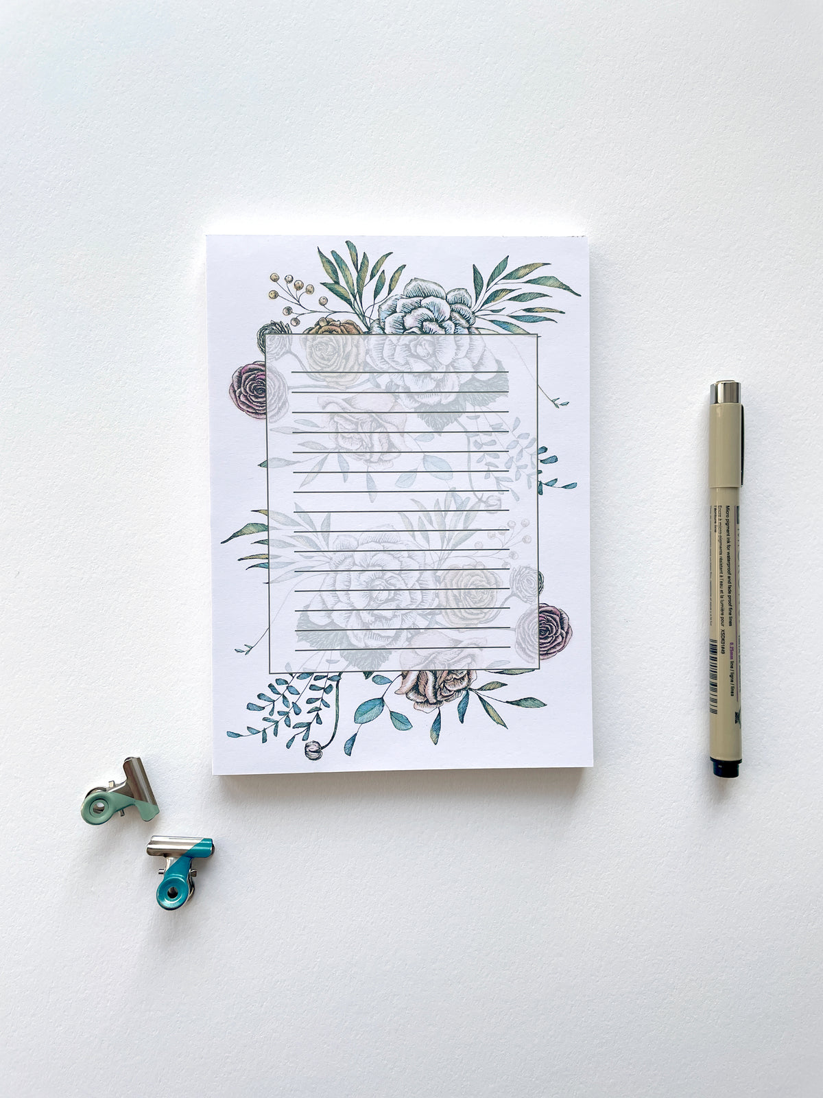 5 by 7 notepad with lined sheets with multi-colored florals by In Good Company