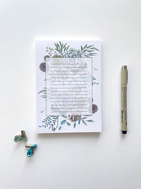 5 by 7 notepad with lined sheets with multi-colored florals by In Good Company