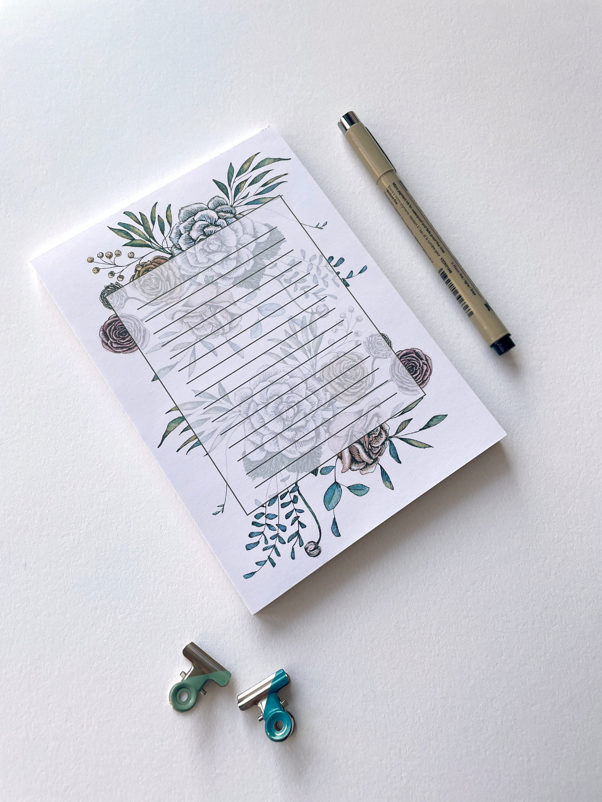 5 by 7 notepad with lined sheets with multi-colored florals by In Good Company