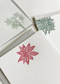 A variety of letterpress holiday flat note cards by In Good Company
