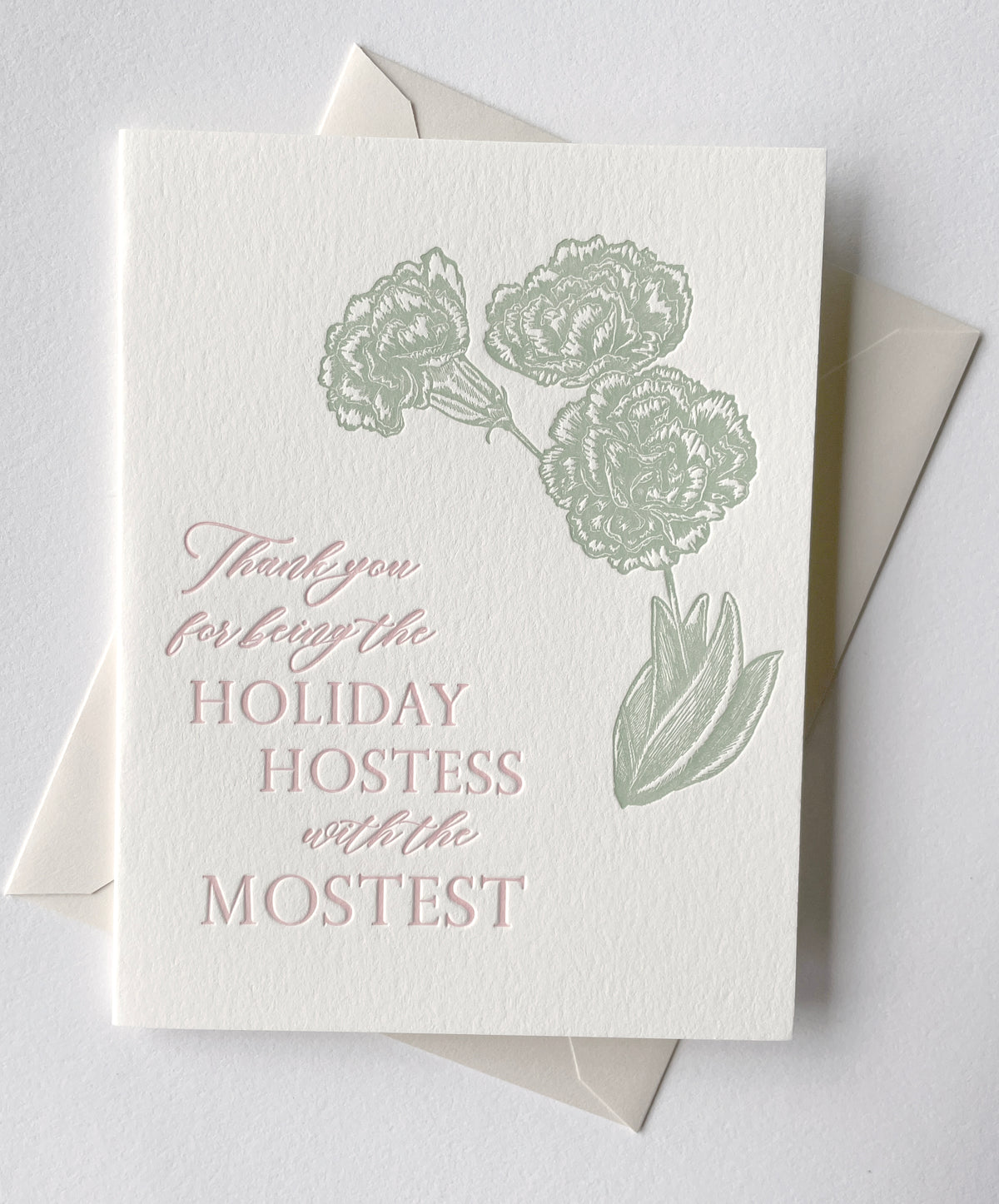 Letterpress holiday card with florals that says "Thank you for being the holiday hostess with the mostest" by In Good Company