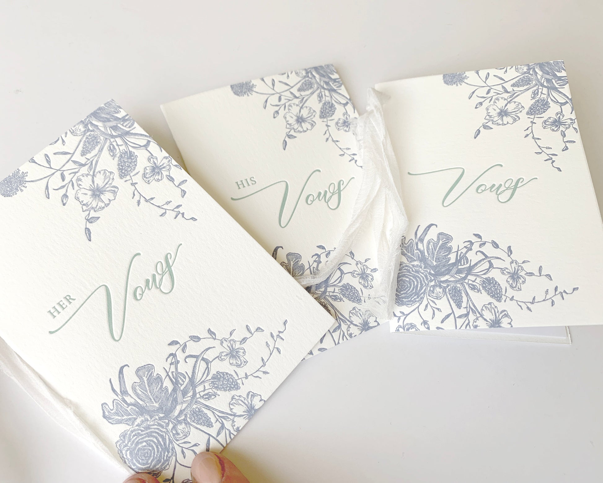 Letterpress vow books with florals that say " Her Vows" or "His Vows" by Rust Belt Love