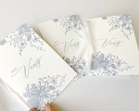 Letterpress vow books with florals that say " Her Vows" or "His Vows" by Rust Belt Love