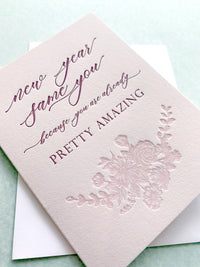 Letterpress holiday card with florals that says "New year same you because you are already pretty amazing" by In Good Company