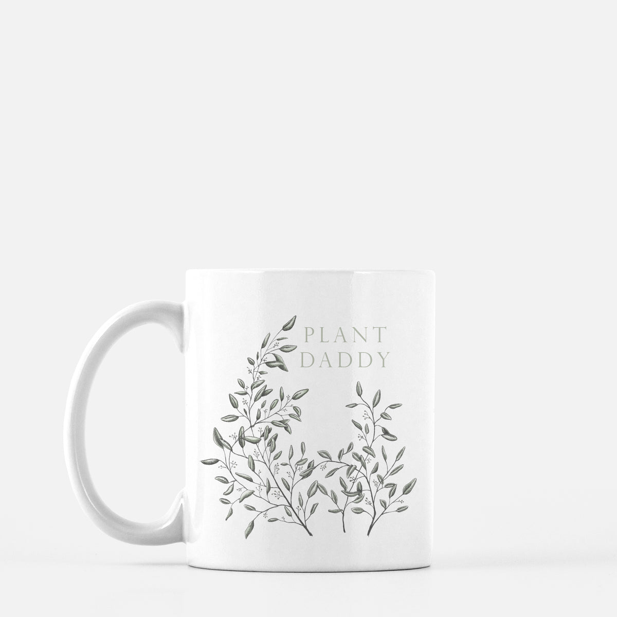White ceramic mug with greenery that says "Plant daddy" by In Good Company