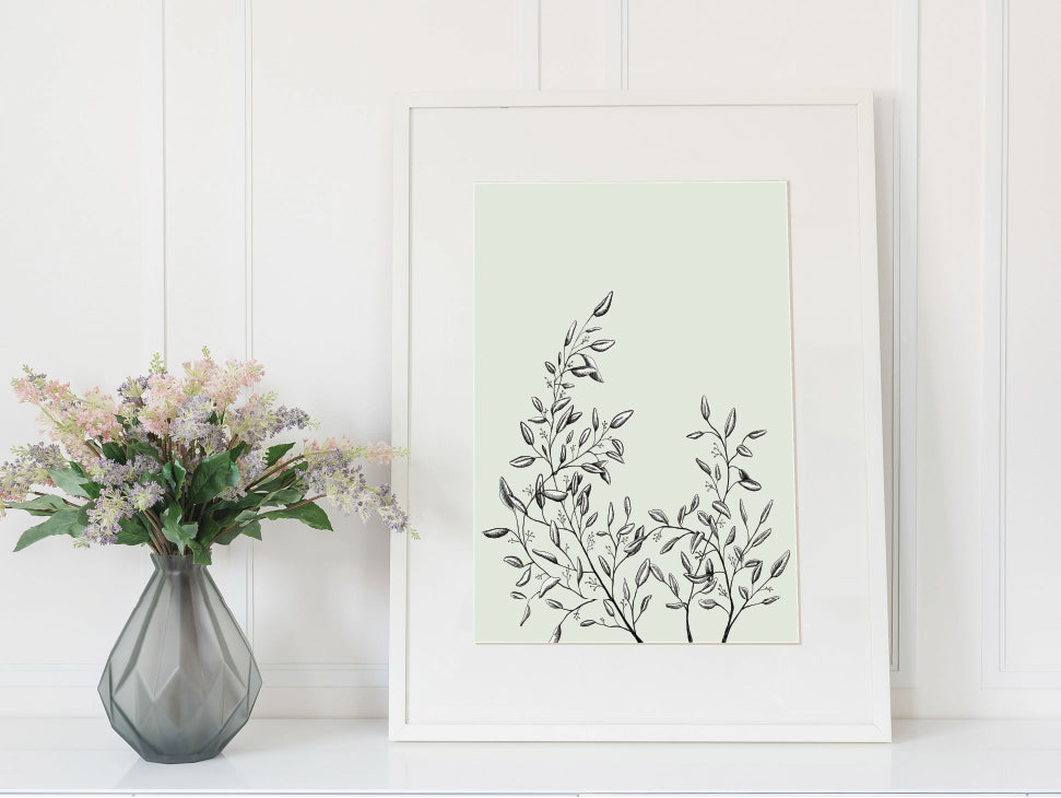 Framed print of a greenery illustration in a sage green color by In Good Company