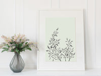 Framed print of a greenery illustration in a sage green color by In Good Company