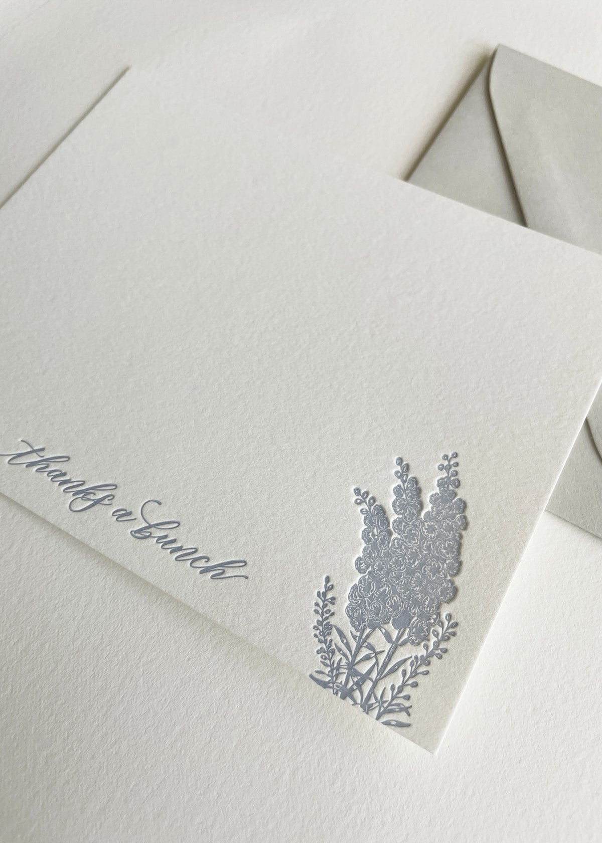 Letterpress flat note card with florals that says "thanks a bunch" by In Good Company